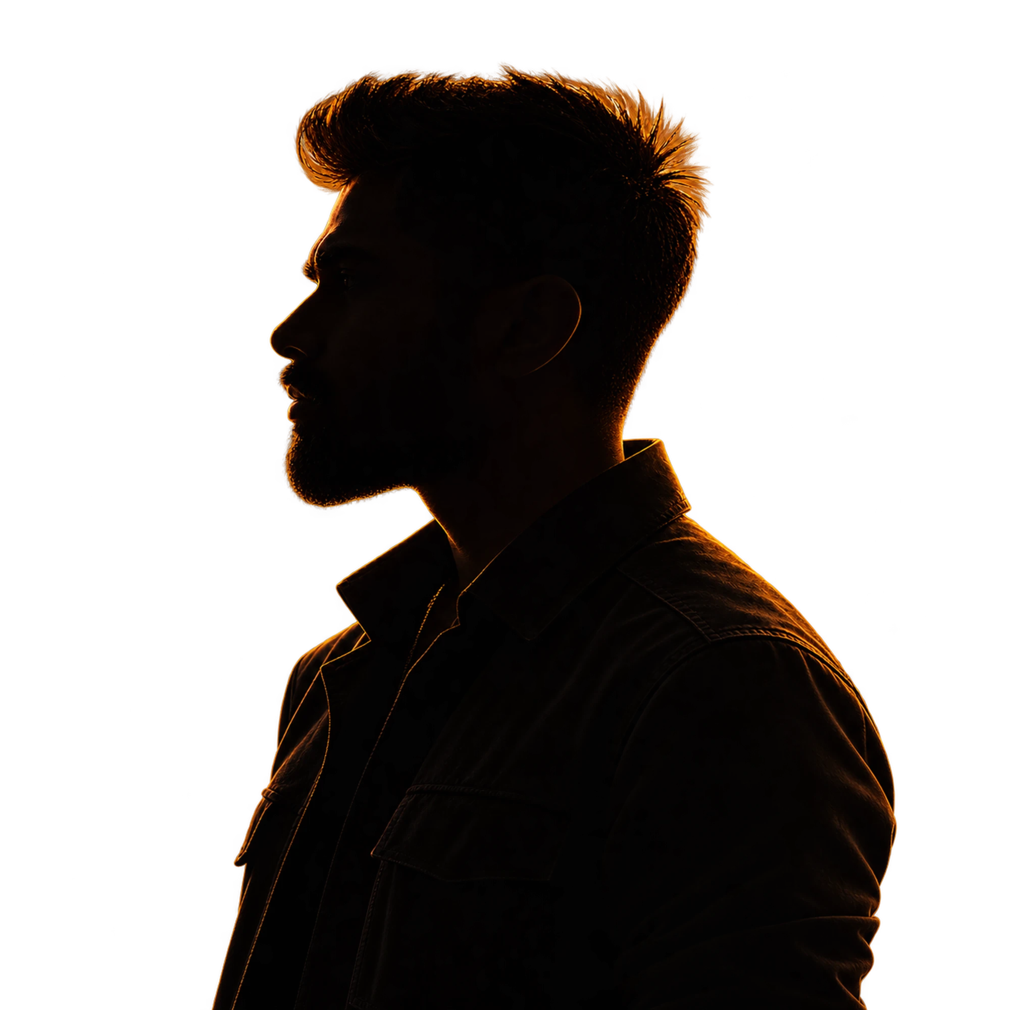 Hemant Rajpal in profile, facing left, lit from behind in amber